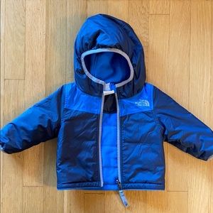 The north face blue reversible hooded jacket